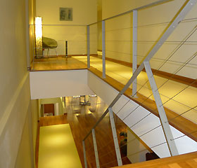 stairs leading up to the rooms from the deli