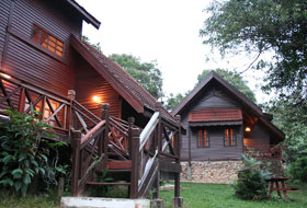 bungalow and chalet in background