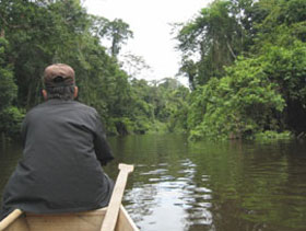 paddling upriver to the water fall at taman negara